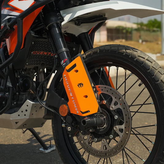 FORK PROTECTORS METAL - ORANGE FOR 2025 FOR KTM 390 Adventure/Adventure X